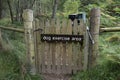 Dog exercise area sign and gate