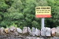 Dog fouling clean up after your dog or face a fine sign Royalty Free Stock Photo