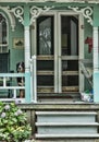 Dog on Gingerbread Front Porch