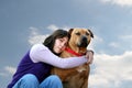 dog girl in clouds sad Royalty Free Stock Photo