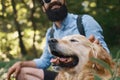 Dog and his owner - Cool dog and young man having fun Royalty Free Stock Photo