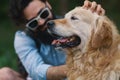 Dog and his owner - Cool dog and young man having fun Royalty Free Stock Photo