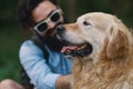 Dog and his owner - Cool dog and young man having fun Royalty Free Stock Photo