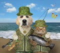 Dog hugs cat with fish on fishing Royalty Free Stock Photo