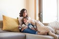 Dog with human family at home Royalty Free Stock Photo