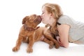 A dog is licking her beautiful mistress Royalty Free Stock Photo