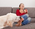 Dog licking the toes Royalty Free Stock Photo