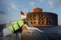 dog in a life jacket in a boat. Ibizan greyhound sea voyage