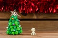 Dog looking Christmas tree Royalty Free Stock Photo