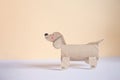 a dog made out of toilet paper roll, cut out of cardboard, dachshund, kids toy, recycled paper craft concept, DIY, Royalty Free Stock Photo