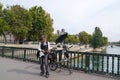 Dog and musician singing and playing the guitar on the bridge