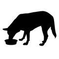 Dog with muzzle in bowl silhouette