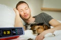 Dog and owner sleeping or dreaming together