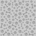 Dog paw. Dog bones seamless pattern. Pattern with traces. Royalty Free Stock Photo