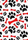 Dog paw print trails and candy cane in shape of bone