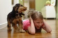 Dog pulling girls hair Royalty Free Stock Photo