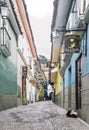 A dog rests on Jaen street, a colonial cobbled street in La Paz, Bolivia