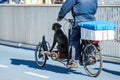 Dog Riding On A Bicycle