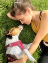 Dog's love lying on green grass