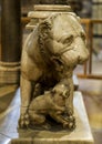 Dog sculpture at base of a column of the Pulpit, in the Siena Cathedral