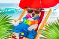 Dog siesta on beach chair Royalty Free Stock Photo