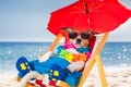 Dog siesta on beach chair Royalty Free Stock Photo