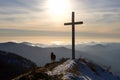 Dog silhouette near a cross on the top of the mountain Royalty Free Stock Photo