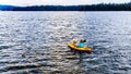 Kayaking on Lac Le Jeune lake near Kamloops, British Columbia, Canada