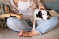 Dog sleeping napping while the owner reading book Royalty Free Stock Photo