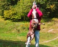 Dog stafordshirsky terrier plays with the owner