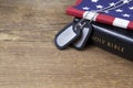 Dog tags with Bible and American Flag Royalty Free Stock Photo