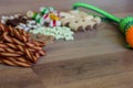 Dog tasty colored biscuits on wooden background Royalty Free Stock Photo