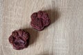 dog treat. pastry food for cat. appetizing dog muffins on wooden background. dog birthday. red velvet. paw shaped dog treat.