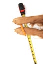 Dog using a tape measure Royalty Free Stock Photo