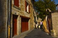 Dog walk Narrow alley architecture Brantome en Perigord France