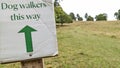 Dog walkers this way sign in the countryside