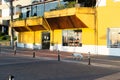 Dog walking through the streets of Porto da Barra, Salvador, in the late afternoon