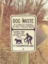 Dog waste sign on trail