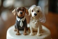 ?Dog wedding cake toppers representing the bride and groom, symbolizing love, celebration, and commitment Royalty Free Stock Photo
