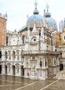 Doge`s Palace or Palazzo Ducale, Venice, Italy. It is famous landmark of Venice. Ornate facade of Doge`s Palace and domes of St Royalty Free Stock Photo