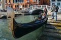 Doge`s Palace and Ponte della Paglia with venetian gondolier on the gondola. Gondola is iconic traditional boat, a