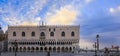 Doge's Palace and Saint Mark column of the Lion at Saint Mark's San Marco square by Grand Canal Venice, Italy at sunrise Royalty Free Stock Photo