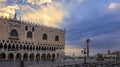 Doge's Palace and Saint Mark column of the Lion at Saint Mark's San Marco square by Grand Canal Venice, Italy at sunrise Royalty Free Stock Photo