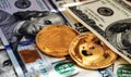 Dogecoin coins in close-up with money, a lot of one hundred dollar bills