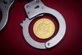 Dogecoin and handcuffs Royalty Free Stock Photo