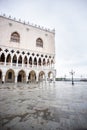 Doges Palace Palazzo Ducale on Saint Mark square at Rainy Morning in Venice Royalty Free Stock Photo