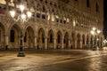 Doges Palace Venice Italy at night with two lamp posts Royalty Free Stock Photo