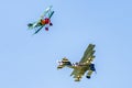 Dogfight between biplane and triplane Royalty Free Stock Photo