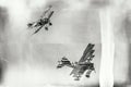 Dogfight between biplane and triplane Royalty Free Stock Photo