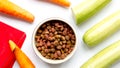 Dogfood, carrot and courgette on table background top view Royalty Free Stock Photo